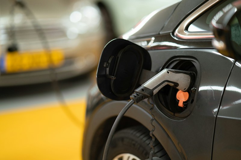 Black car with charging cable